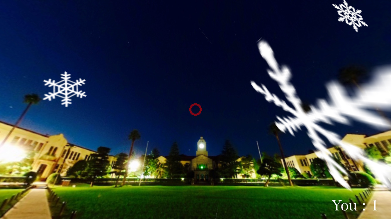 時計台を中央に、雪が降ってきている画像。アプリケーションのスクリーンショット